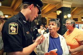 Wisconsin Capitol Police threaten to arrest Tucson tourist - for observing Solidarity Sing Along
